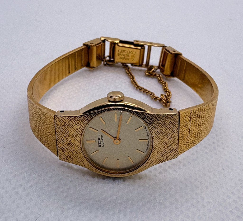 Vintage 1983 Seiko Quartz Ladies Watch Gold Tone 16mm Champagne Dial 2C20-0129