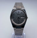 1981 Seiko SQ 8223-7149 Quartz 35mm Mens Watch Silver Sunburst Day Date