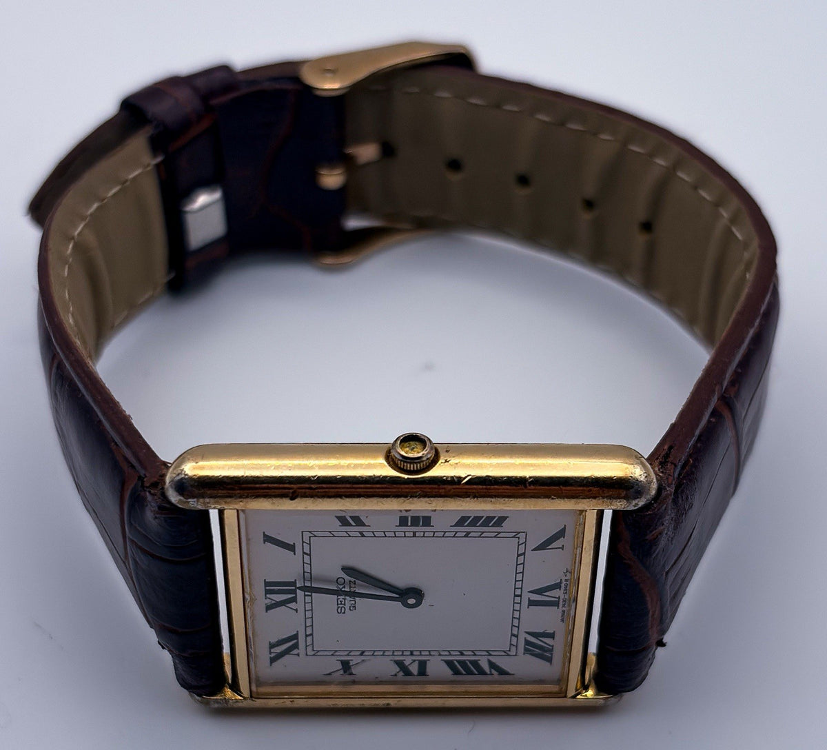 Vintage 1983 Seiko Tank Quartz 7430-5209 Gold Tone White Roman Mens Dress Watch