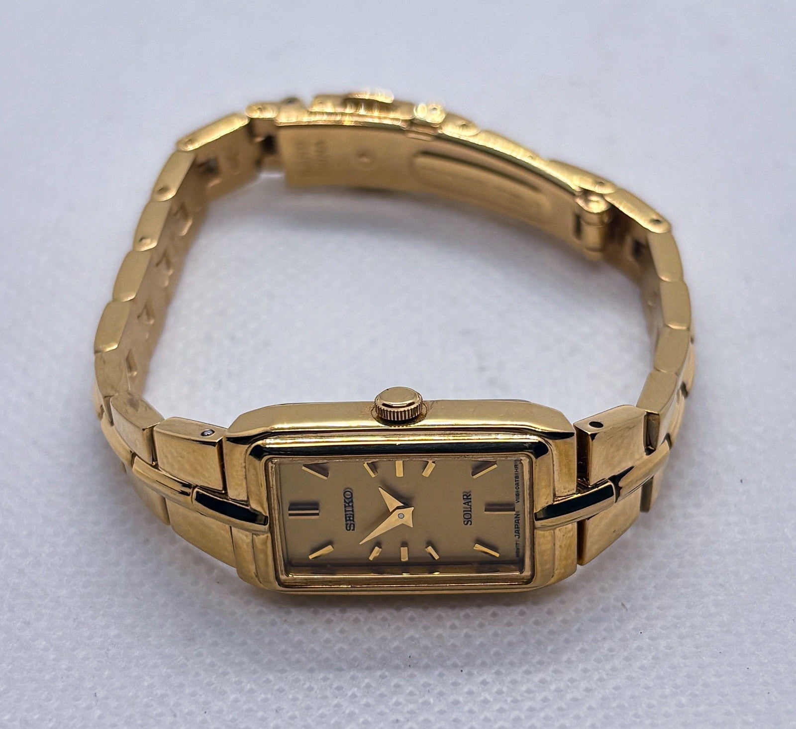 Seiko Solar Women's Tank Watch V116-0AH0 Gold Tone Rectangle Dress Wristwatch