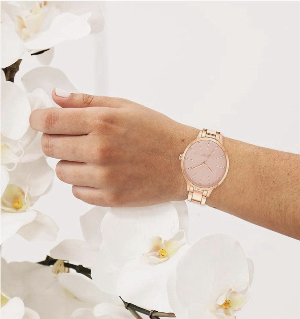 Nine West Women'S Crystal Accented Bracelet Watch Domed mineral crystal lens