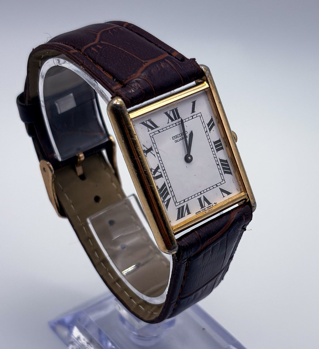 Vintage 1983 Seiko Tank Quartz 7430-5209 Gold Tone White Roman Mens Dress Watch
