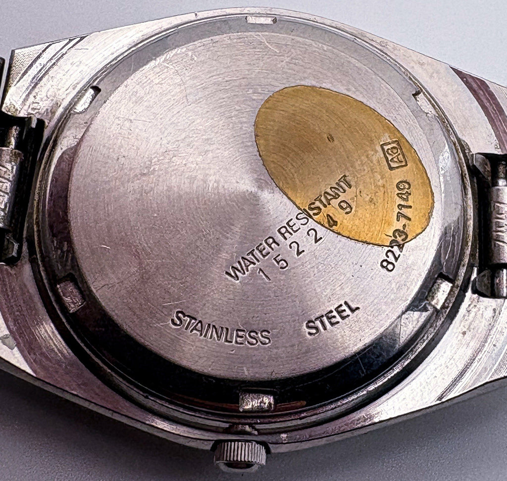 1981 Seiko SQ 8223-7149 Quartz 35mm Mens Watch Silver Sunburst Day Date