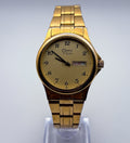 Vintage 1994 Caravelle by Bulova T4 Gold Quartz 35mm Mens Watch Day Date 42C85