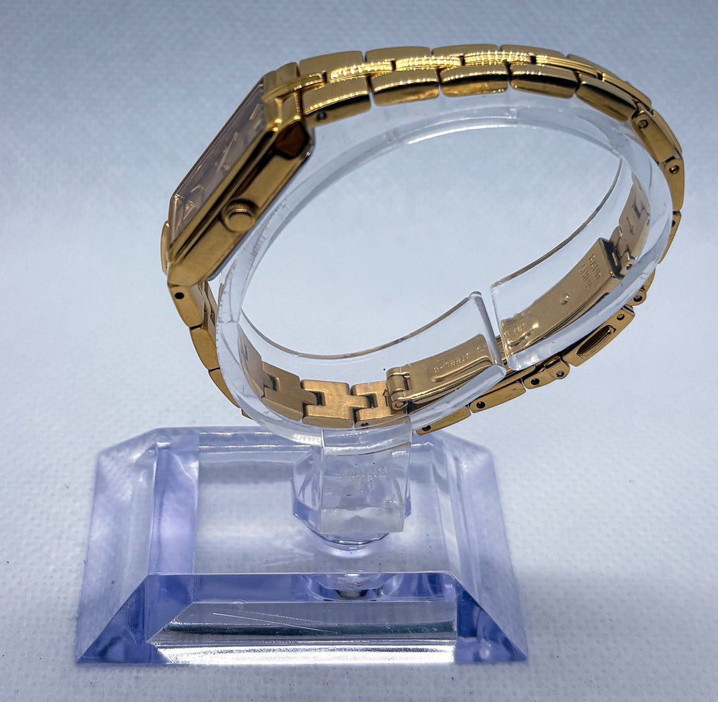 Seiko Solar Women's Tank Watch V116-0AH0 Gold Tone Rectangle Dress Wristwatch