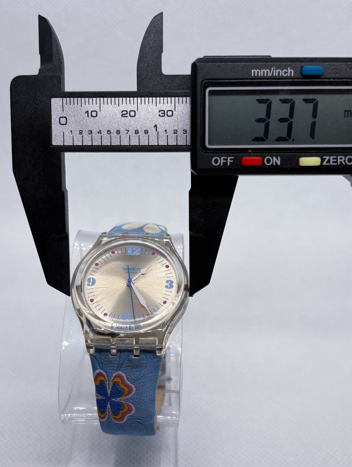 Swatch Happy Field Watch Silver Face Embroidered Flowers Band Clear Case GE146