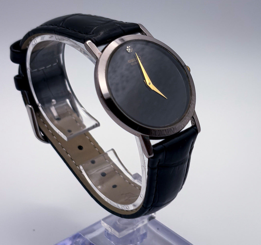 Vintage Seiko 7N00-8A49 Quartz Movt Japan Black Dial Diamond Marker Watch