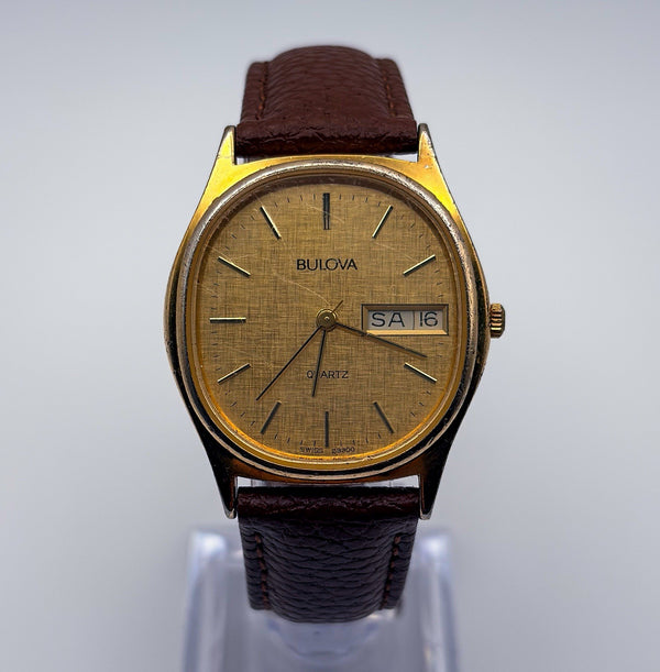 Vintage 1983 Bulova Quartz P3 35mm Linen Dial Gold Plated Day Date Mens Watch