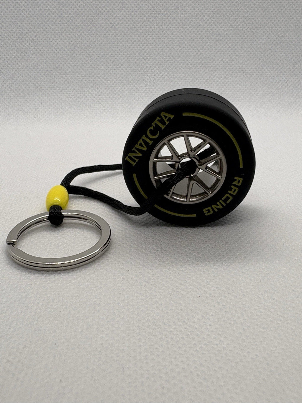 Invicta Racing F1 Rubber Medium Racing Tire Yellow Striped Keychain IG0346 NEW