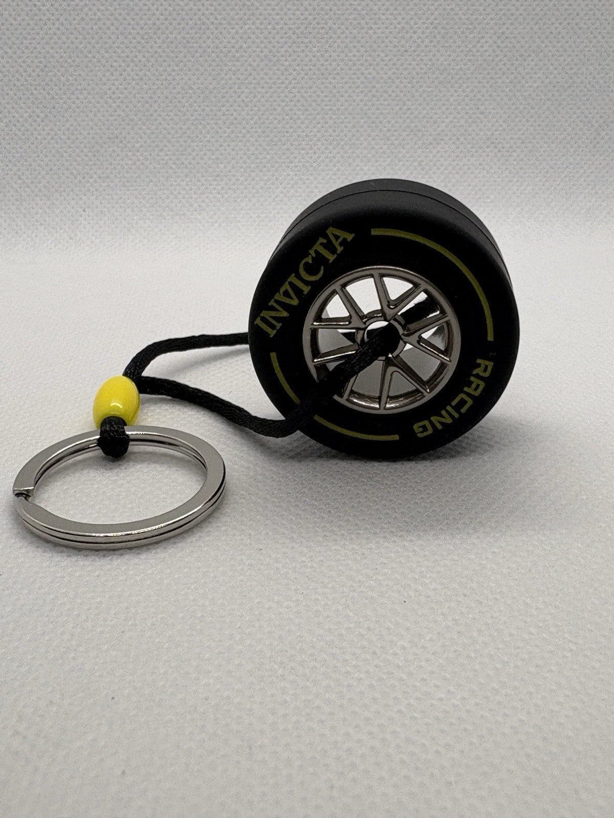 Invicta Racing F1 Rubber Medium Racing Tire Yellow Striped Keychain IG0346 NEW