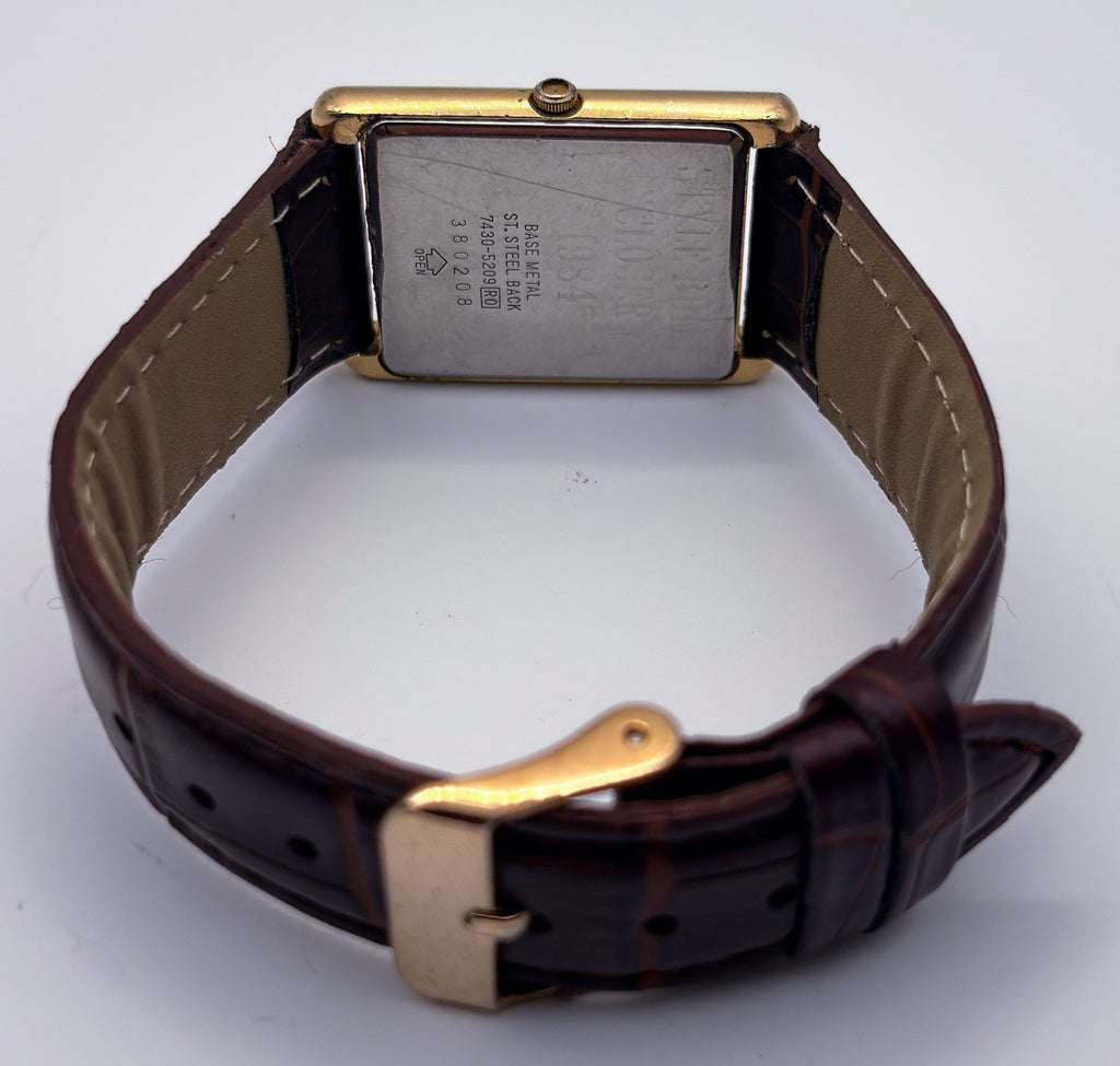 Vintage 1983 Seiko Tank Quartz 7430-5209 Gold Tone White Roman Mens Dress Watch