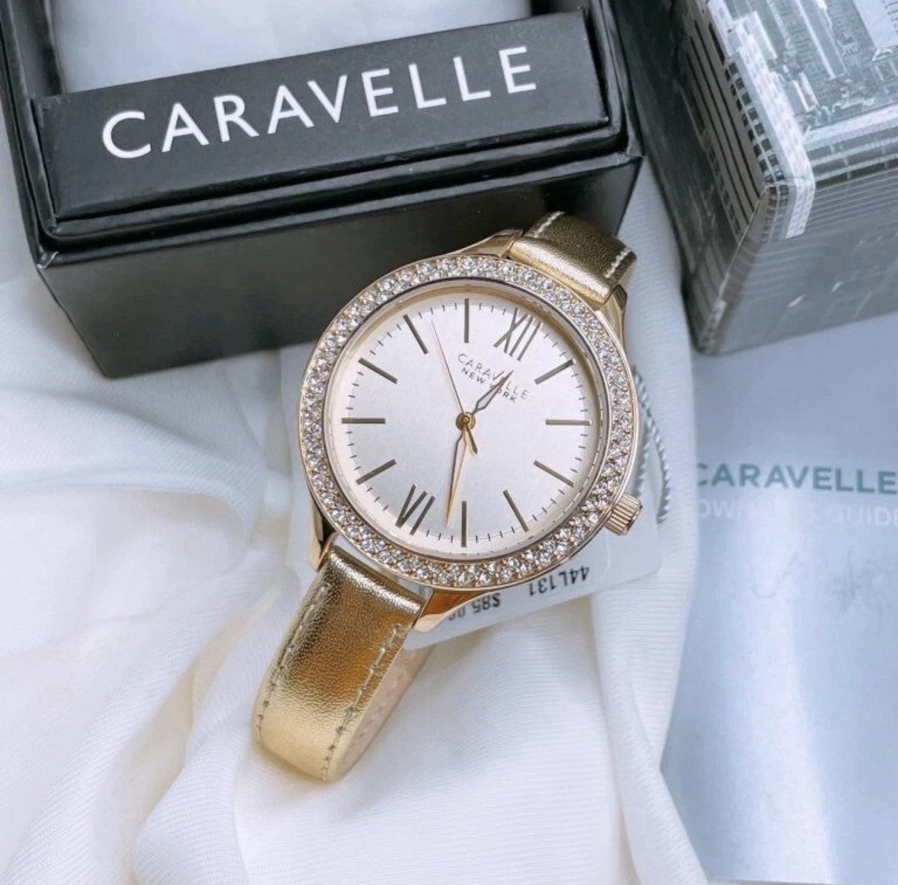 Caravelle New York Ladies Gold Dial Crystal Accent Gold Leather Watch 44L131
