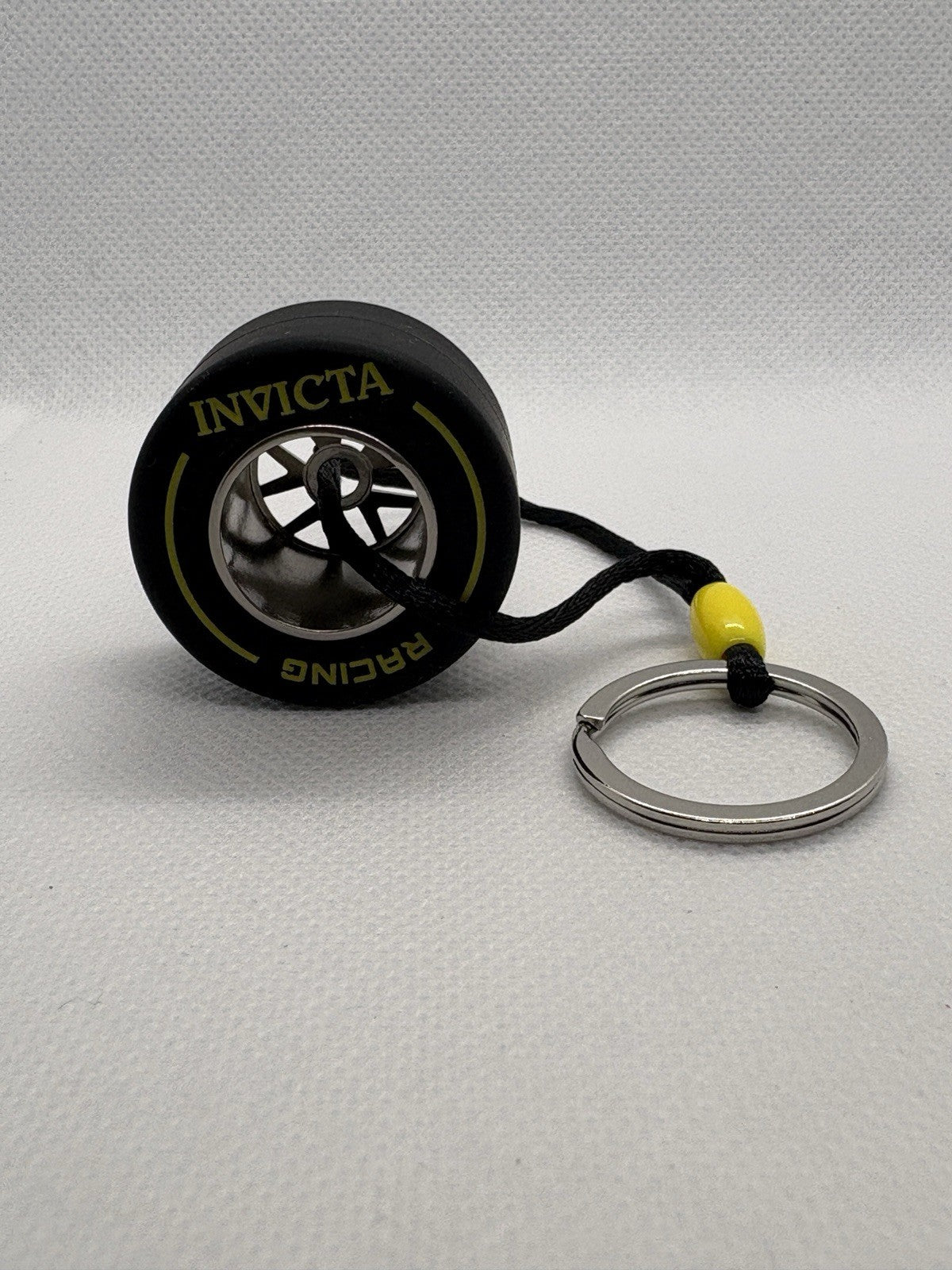 Invicta Racing F1 Rubber Medium Racing Tire Yellow Striped Keychain IG0346 NEW