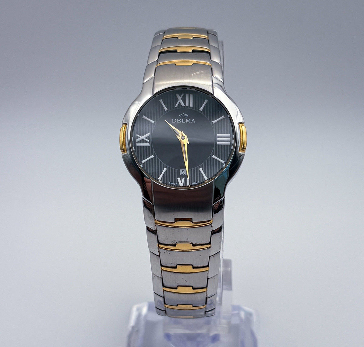Vintage Delma 467.489Y Swiss Quartz Sapphire Black Pinstripe Ladies Dress Watch