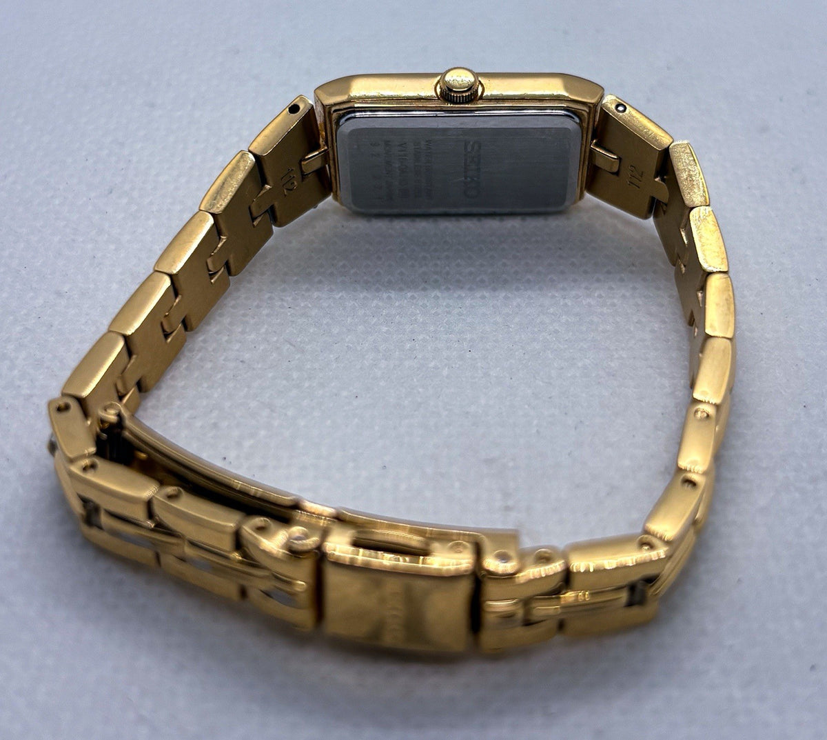 Seiko Solar Women's Tank Watch V116-0AH0 Gold Tone Rectangle Dress Wristwatch