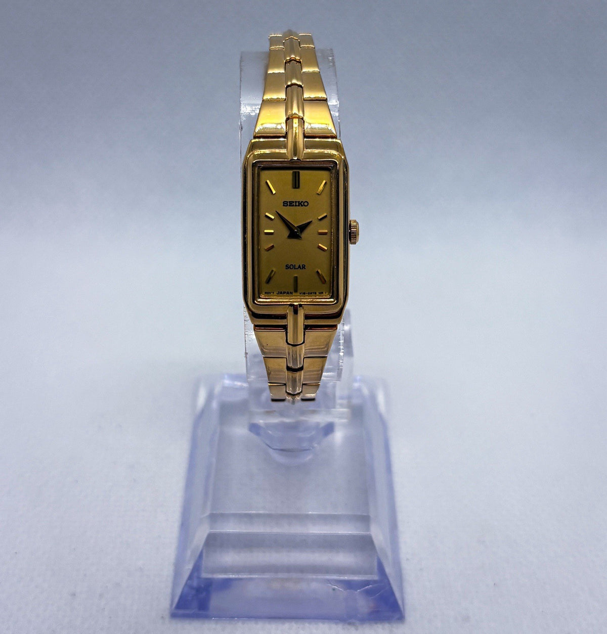 Seiko Solar Women's Tank Watch V116-0AH0 Gold Tone Rectangle Dress Wristwatch