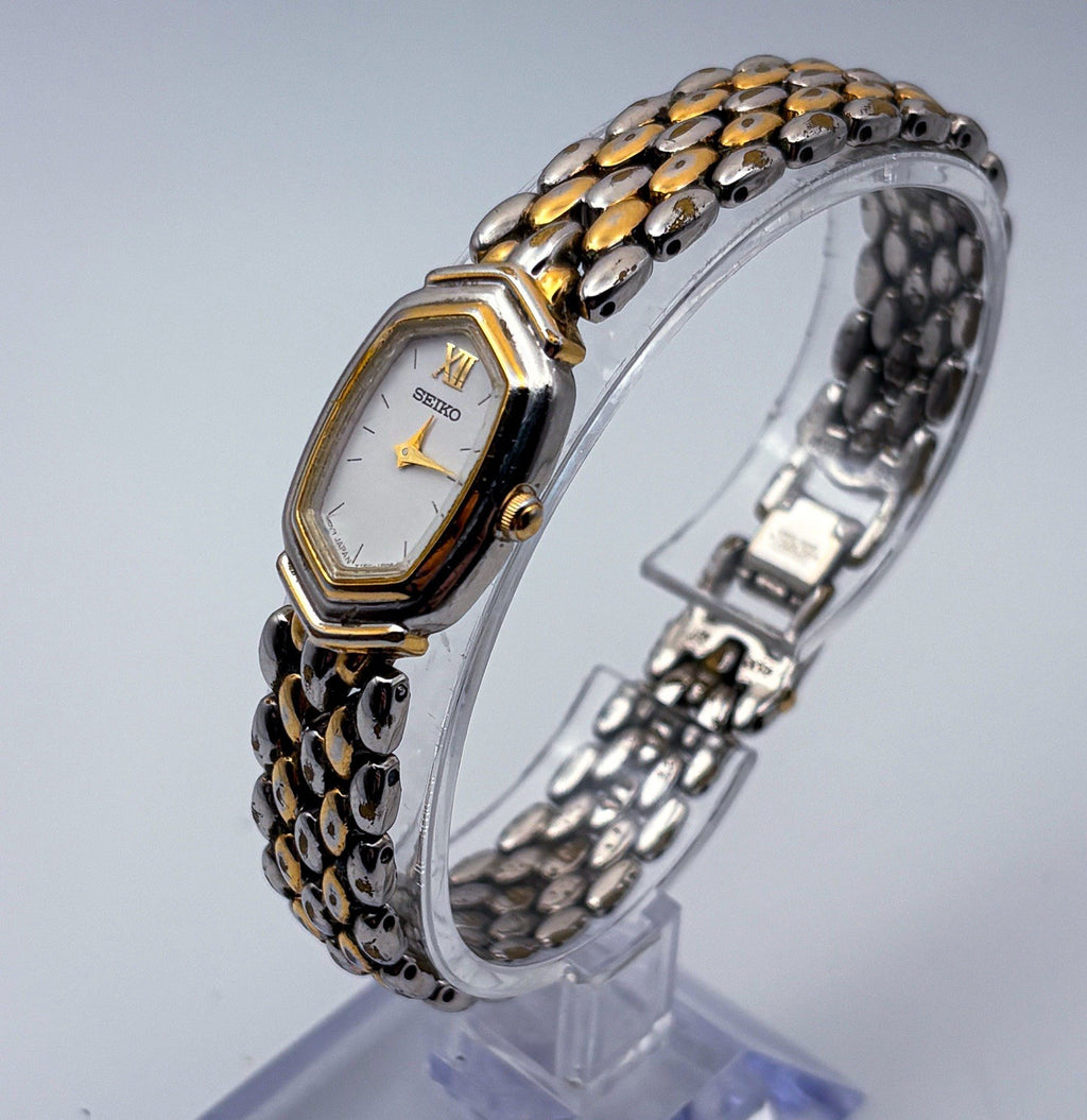 VTG 1999 Seiko Y150-5M89 Ladies Two Tone Rice Link Watch White Hex Shield Dial