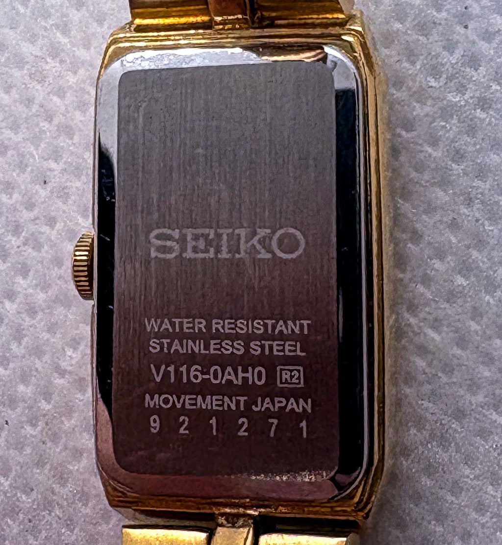 Seiko Solar Women's Tank Watch V116-0AH0 Gold Tone Rectangle Dress Wristwatch